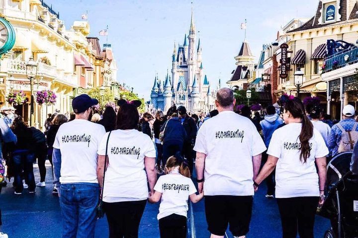 During a visit to Disney World, a family proudly wore shirts that had "#CO-PARENTING" on them. 