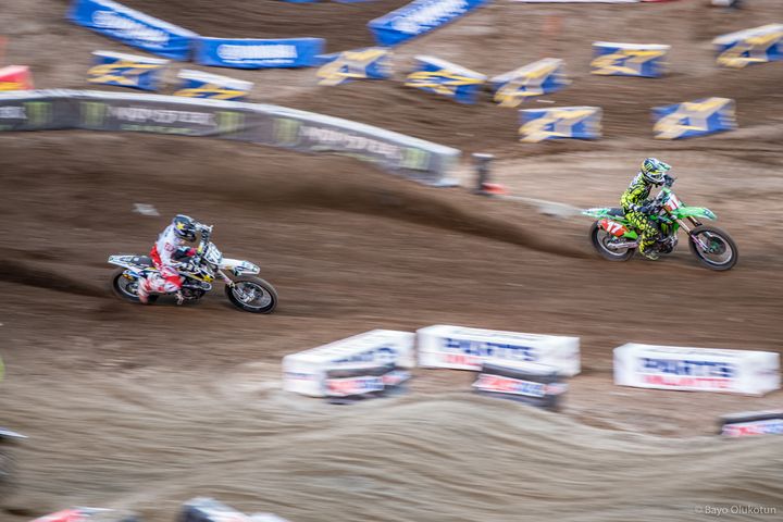Zack Osborne (left) sets up the pass for the lead on Joey Savatgy during the 250SX East Main Event. Thanks to a penalty on Savatgy, he and Osborne are now tied in points with one round remaining. Jordan Smith is one point ahead in the lead.