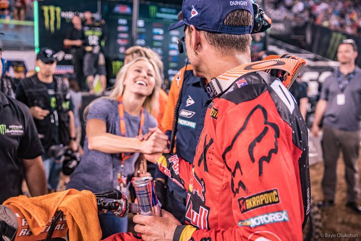 Dungey receives a congratulatory handshake and hug from his wife, Lindsay, just after capturing the win in New Jersey.