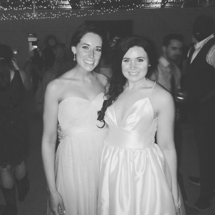 Katie (left) posing with the bride (right). 