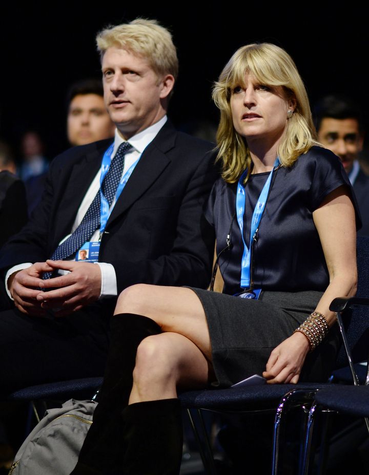 Rachel and Jo Johnson listen to their brother address the 2015 Conservative Party conference