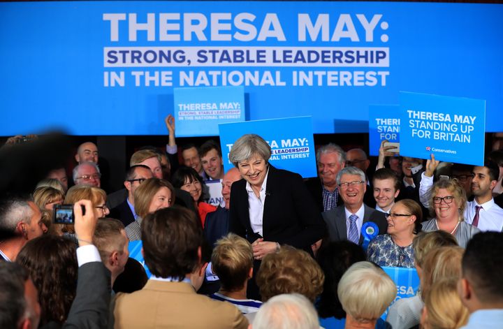 Theresa May addresses an audience of supporters during a campaign stop in Ormskirk, West Lancashire.