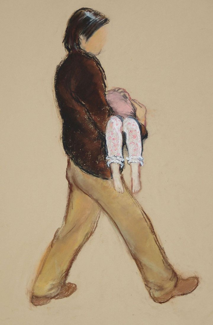 A sketch from the time of the man seen carrying a child in pink pyjamas