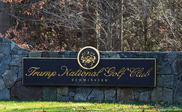 A sign on the stone wall greets visitors to the Trump National Golf Club on November 18, 2016 in Bedminster Township, New Jersey.