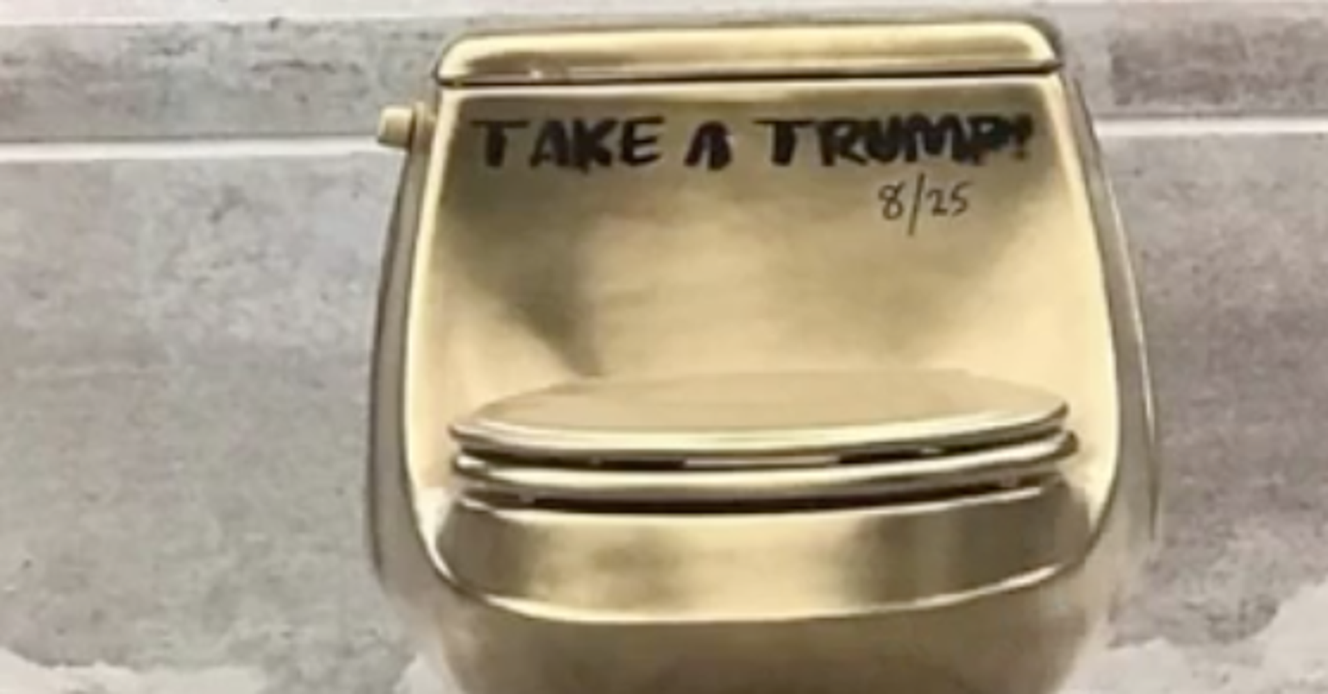 Mysterious Gold Toilets Are Popping Up So People Can 'Take A Trump