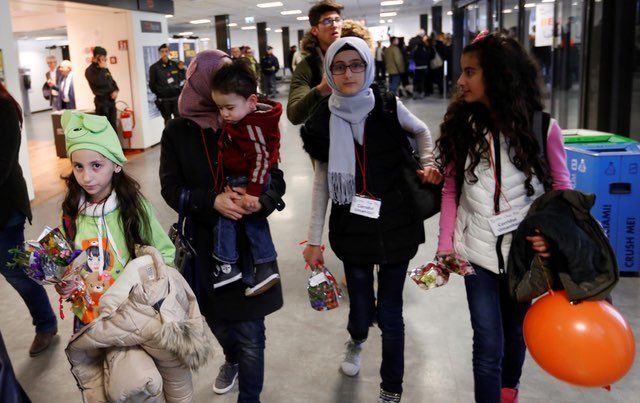 Syrian refugees arrive at Leonardo da Vinci International Airport in Rome, Italy on January 30, 2017 through 'humanitarian corridors'.