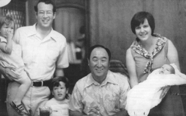 Me (left) with my parents, brothers and Rev. Moon in the early days