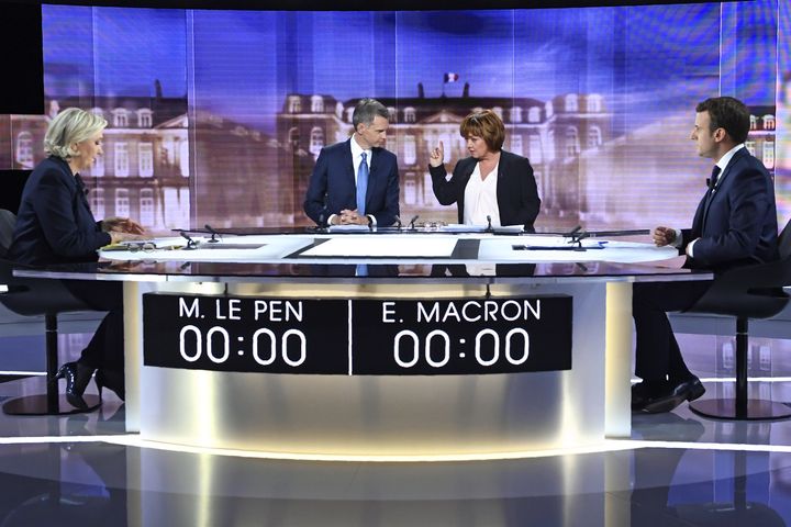 The two-and-a-half hour TV debate took place just days before Sunday’s run-off vote for the presidency; also pictured above are French journalists Christophe Jakubyszyn and Nathalie Saint-Cricq