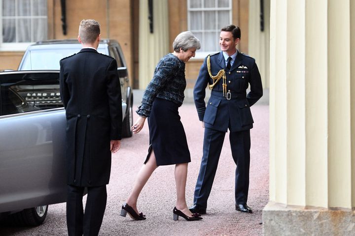 Theresa May arrives at Buckingham Palace for an audience with the Queen on Wednesday
