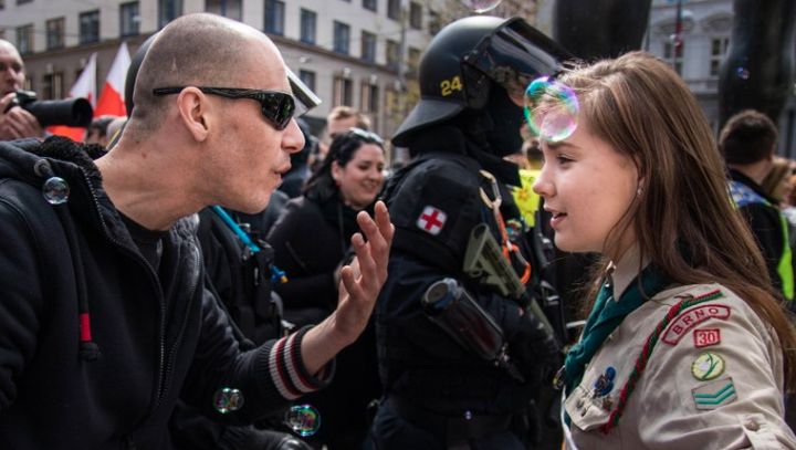 The Girl Scout was at a peaceful counter-demonstration while a man shouted in her face