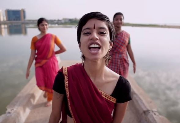 A still from a viral parody music video pressuring Unilever to pay compensation to 591 victims of mercury poisoning.