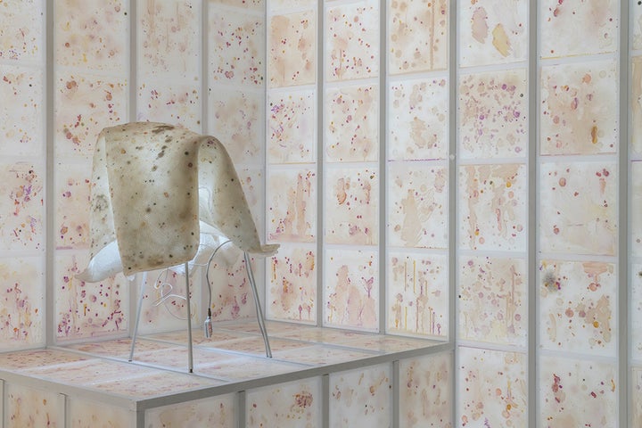 <p>Anicka Yi, <em>Force Majeure</em>, 2017 (detail), plexiglas, aluminum, agar, bacteria, refrigeration system, LED lights, glass, epoxy resin, powder coated stainless steel, light bulbs, digital clocks, silicone, and silk flowers. Courtesy the artist and 47 Canal, New York. Photo: David Heald © Solomon R. Guggenheim Foundation.</p>