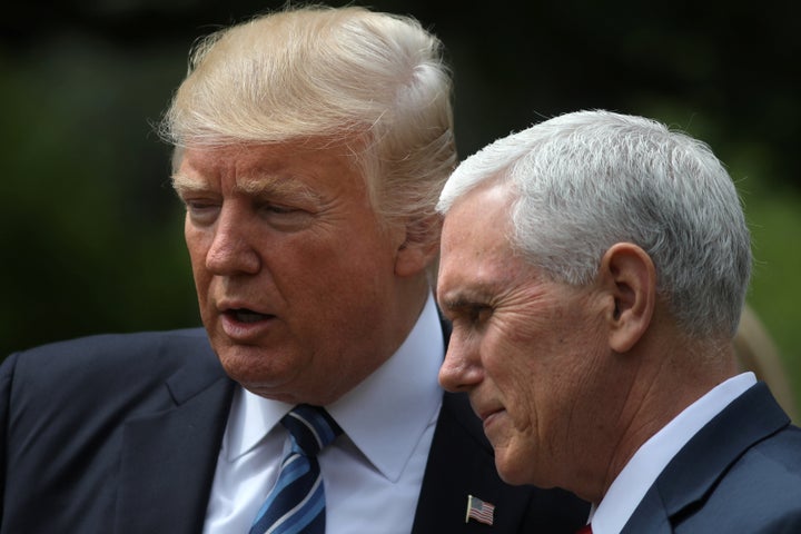 U.S. President Donald Trump and Vice President Mike Pence attend a National Day of Prayer event at the Rose Garden of the Whi