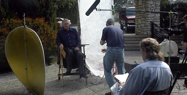 <p>John Mulholland interviews Charlton Heston for <em>The True Gen.</em></p>