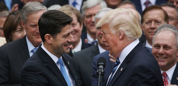 U.S. President Donald Trump congratulates House Speaker Paul Ryan (R-WI) after Republicans passed legislation aimed at repealing and replacing ObamaCare.