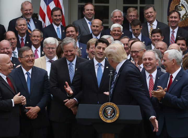 President Trump congratulates jubilant House Republicans after they voted to repeal major parts of Obamacare.