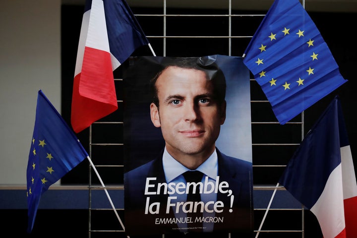 An electoral poster of Emmanuel Macron, France’s centre-left presidential candidate, calling for unity. 