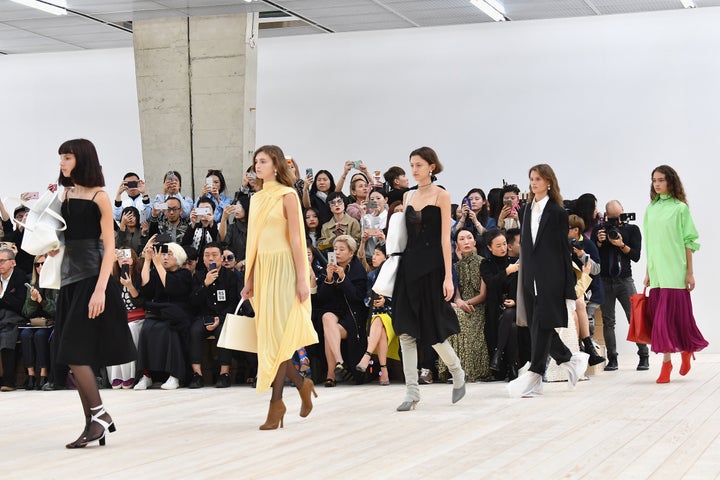 Models walk the runway during the Celine show during Paris Fashion Week for spring/summer 2017 on 2 October 2016 in Paris, France. 