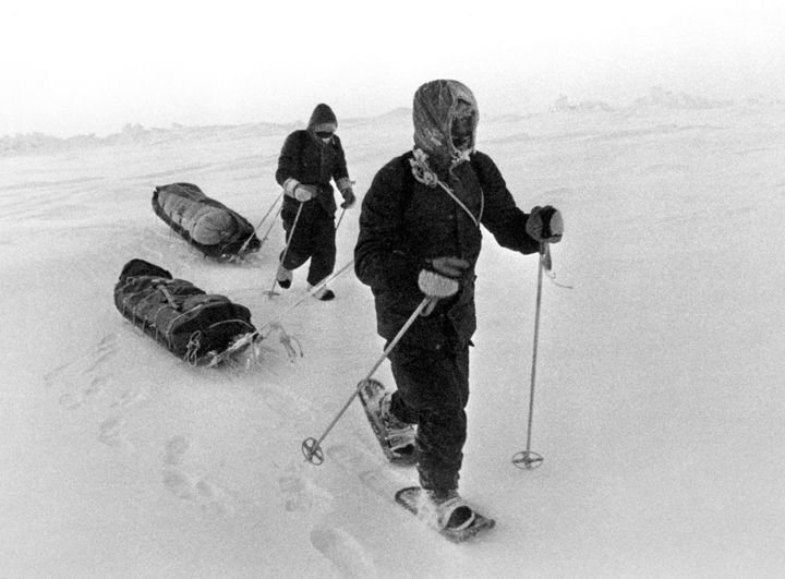 Sir Ranulph Fiennes (l) and Charles Burton (r) trekking across the Arctic wastes on their way to the North Pole. 