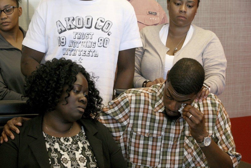 Odell Edwards, the father of 15-year-old Jordan Edwards, wiped away tears as he sat with his wife, Charmaine Edwards. Jordan