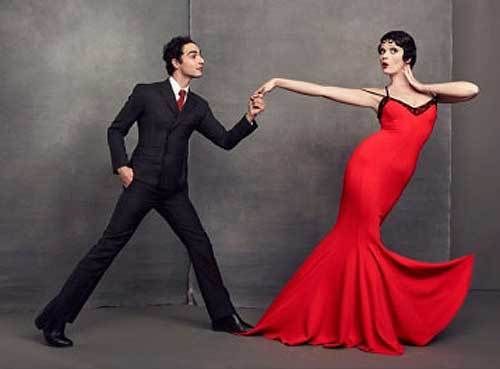 <p>Designer Zac Posen and model Crystal Renn show off his Betty Boop-inspired gown</p>