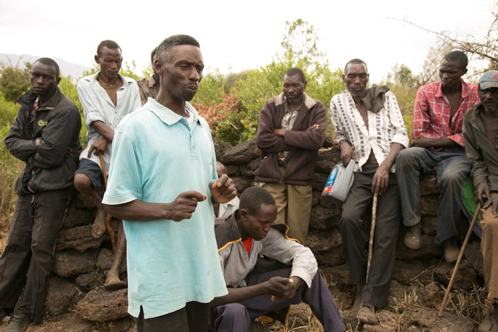 Joseph Kariuki speaks to locals about getting treated for the flesh-eating disease cutaneous leishmaniasis.