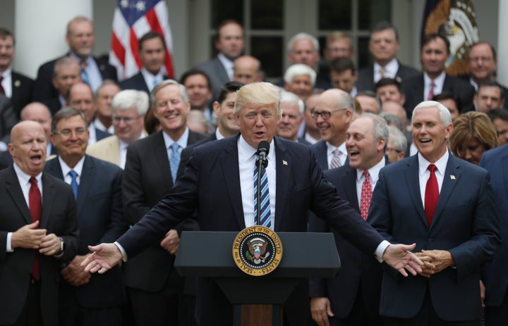 President Donald Trump and congressional Republicans celebrate the House's passage of the American Health Care Act. They are