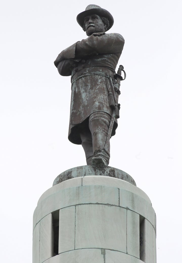 A 60 ft (18 m) tall monument to Confederate General Robert E. Lee towers over a traffic circle in New Orleans, Louisiana.