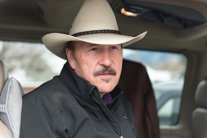 Montana Democrat Rob Quist, seen here campaigning, is attacking GOP opponent Greg Gianforte over accusations of disability discrimination against a former employee.