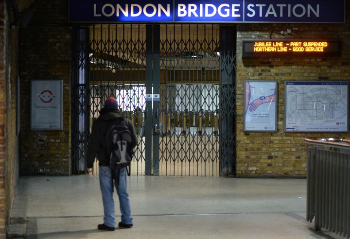 A man looks at locked gates at London Bridge station, London, as a strike by London Underground workers caused travel chaos in the capital. File image.