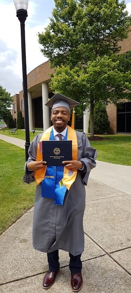 Ferrell Lewis, today at his college graduation. He graduated magna cum laude in Computer Information Technology. 