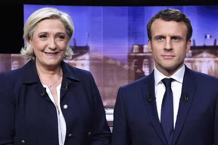 Emmanuel Macron, head of the political movement En Marche!, or Onwards!, and Marine Le Pen, of the French National Front (FN) party, prior to the start of a live prime-time debate.