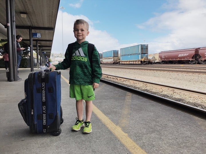 My 5-year-old son at the train station during a mother-son trip to the Northwest.