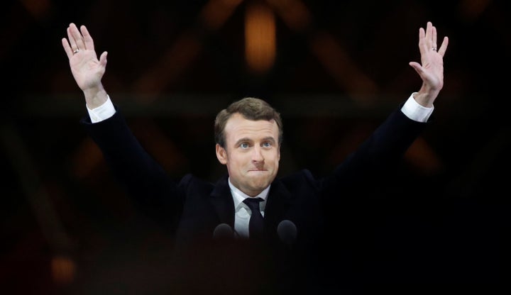 French President-elect Emmanuel Macron celebrates after winning Sunday's election. 