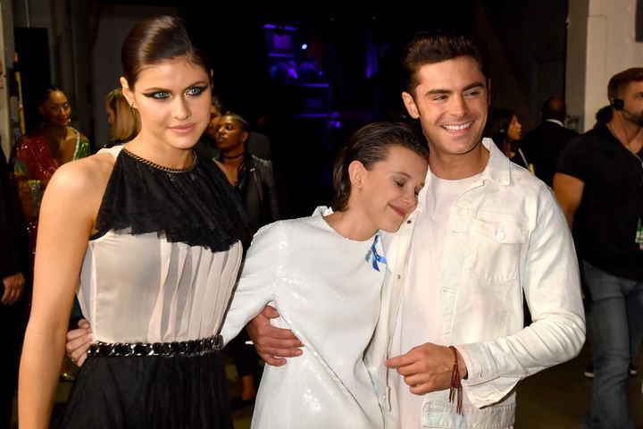 Alexandra Daddario, Millie Bobby Brown and Zac Efron attend the 2017 MTV Movie And TV Awards.