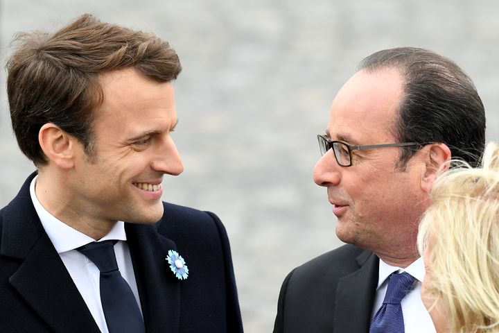 French president-elect Emmanuel Macron attends a ceremony in Paris on Monday with outgoing French President Francois Hollande 