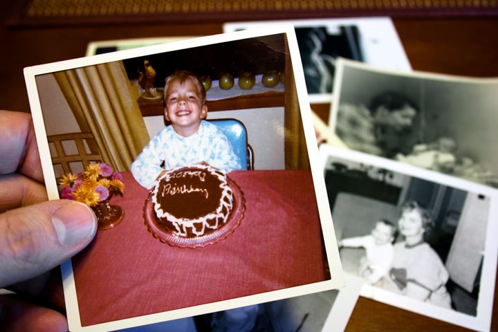 An old photo of a birthday boy. The combination of the food with the celebration and the people attending it is just the recipe needed for making powerful food memories.