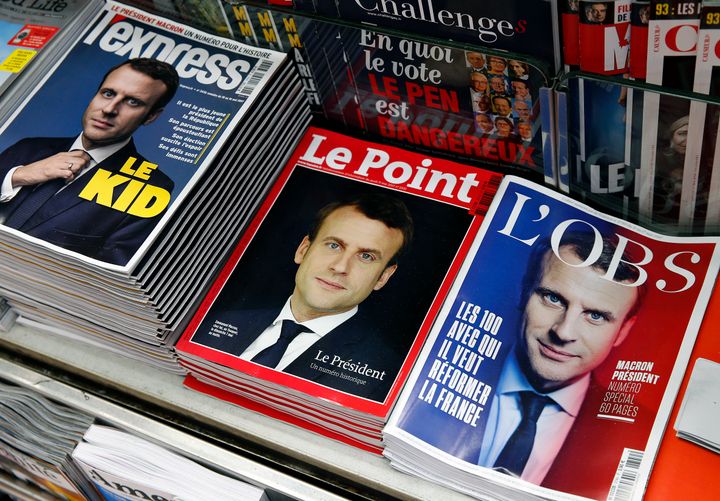 French magazine front covers feature the picture of French President-elect Emmanuel Macron. May 8, Paris.