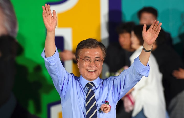 South Korean presidential candidate Moon Jae-In of the Democratic Party attends his election campaign in Seoul on May 8, 2017