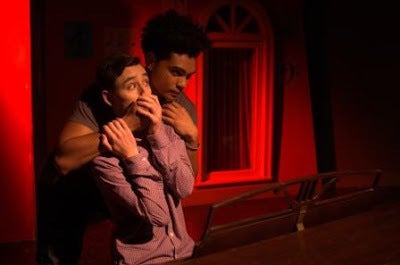 Matt (Geoffrey Malveaux) terrorizes Beethoven (Ryan Engstrom) in a scene from Dog Sees God 