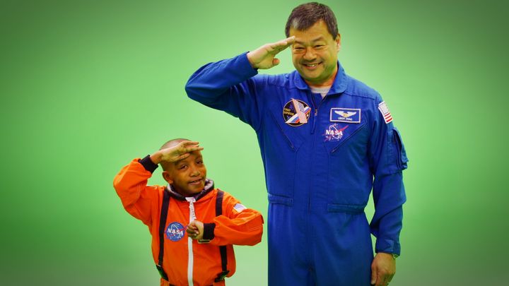 Zayden Wright and Commander LeRoy Chiao preparing for “blast-off”