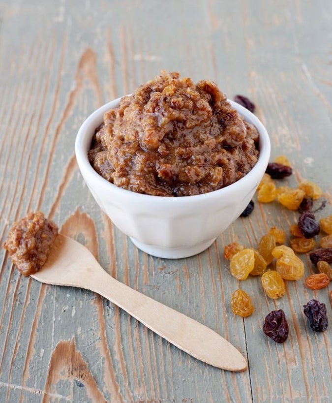 A bowl of raisin paste waiting to sweeten something up.