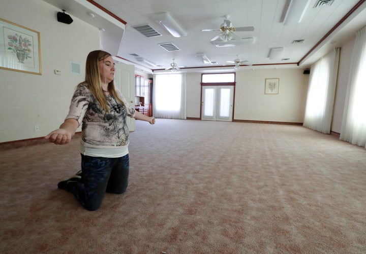 Briell Decker, the 65th wife of jailed Fundamentalist Church of Jesus Christ of Latter-Day Saints (FLDS Church) polygamist prophet leader Warren Jeffs, shows how she prayed every hour on the hour with other wives of his in the prayer room at his compound, where he lived for several years, in Hildale, Utah, U.S., May 3, 2017.