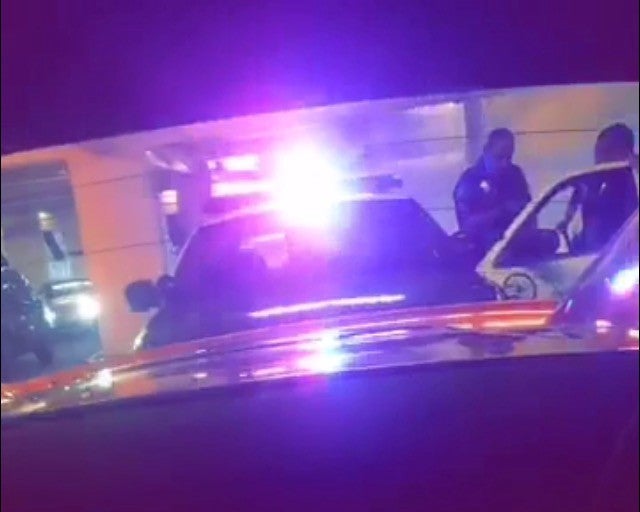<p><em>The police behind me in the parking garage just before the ticket gate.</em> </p>