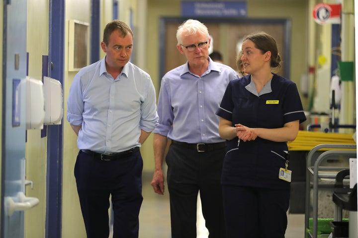 Lib Dem leader Tim Farron (L) and his health spokesman Norman Lamb.