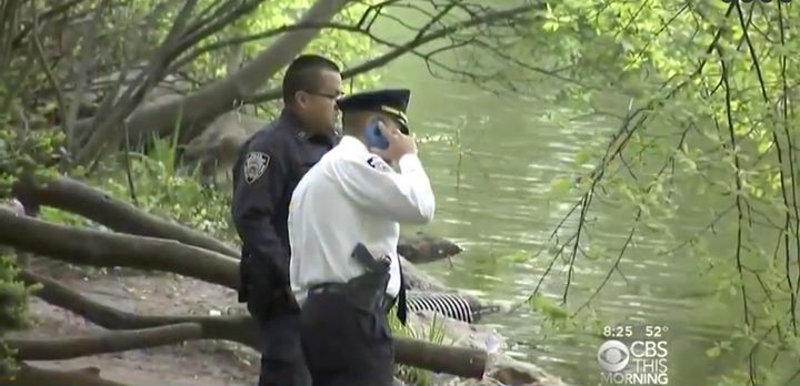 Police at a Central Park pond on Wednesday after a body was recovered from the water.
