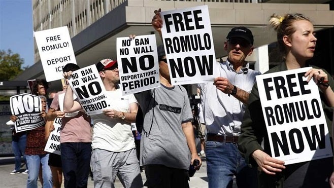 Family and supporters of Romulo Avelica-Gonzalez, an immigrant who was arrested in February after he dropped his daughter off