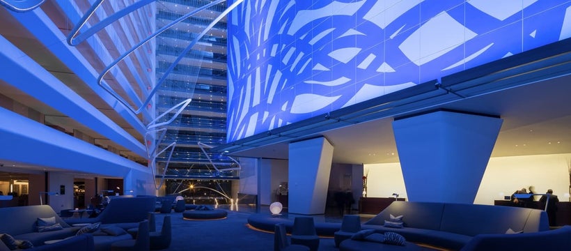 The lobby at <a rel="nofollow" href="http://www.conradnewyork.com/?WT.mc_id=zLADA0WW1XX2PSH3DA4PPC5PPC6MULTIBR7_709529_107222