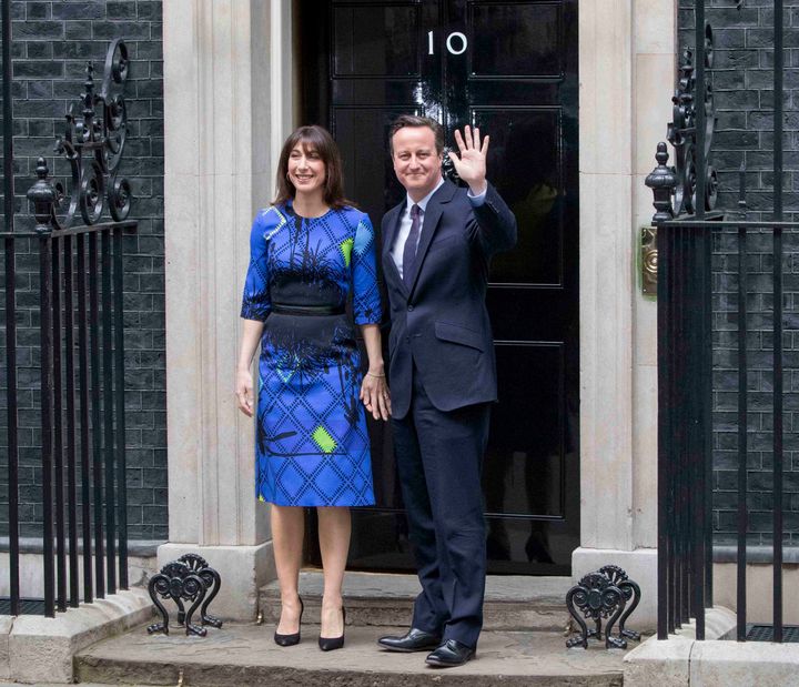 David Cameron stands on the steps of Number 10 after winning a second term
