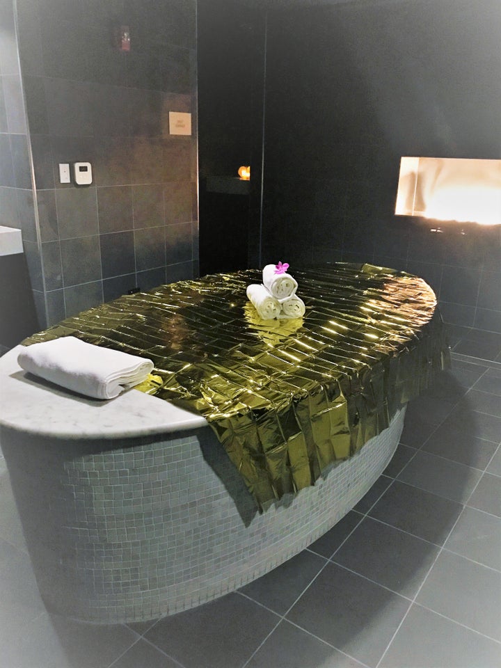 <p>24K Gold Spa Experience features being “painted in gold” and cocooned in a gold-infused wrap.</p>